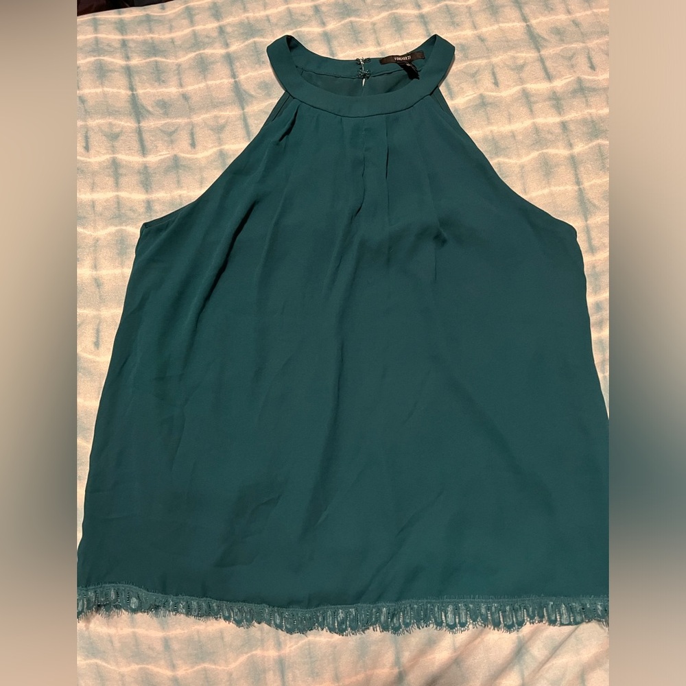 Woman’s Forever21 Teal colored tank top size Medium